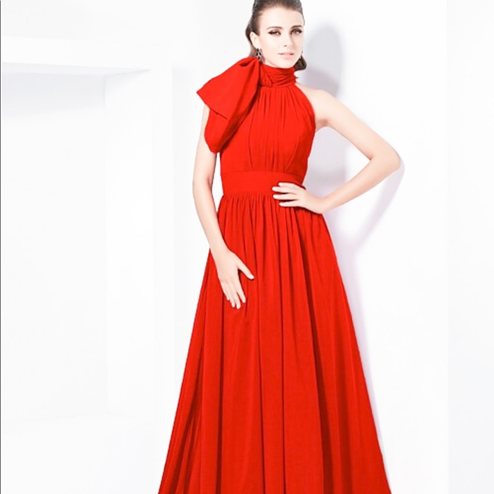 Striking red occasion dress with court train.